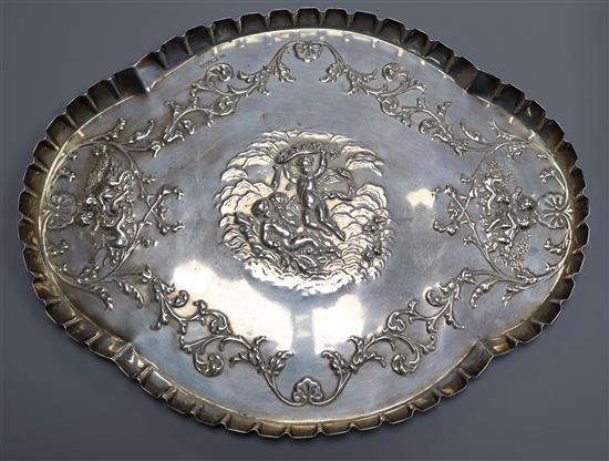 An Edwardian repousse silver Reynolds Angels dressing table tray, James Deakin & Sons, Chester, 1902, 9 oz.